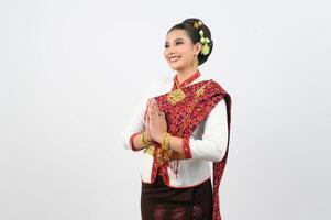 Portrait of Beautiful Thai Woman in Traditional Clothing standing Posing photo