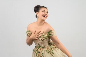 Young asian beautiful bride smiling with happy on white background photo