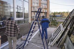 Replacement of double-glazed windows in shop windows, reconstruction of the supermarket facade, repair of windows photo