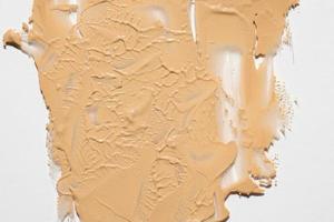 tinted foundation smudge background photo