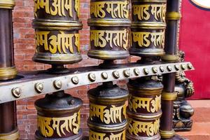 Batu-Indonesia, January 2, 2023. Selective focus of prayer wheel in front of the temple. photo