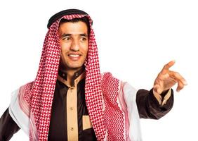 Arab man pressing virtual button on white photo