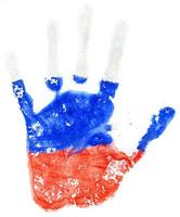 huella de la mano de un ruso bandera en un blanco foto