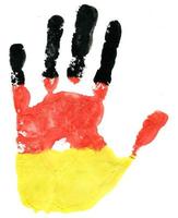 Handprint of a German flag on a white photo