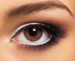 Closeup of beautiful eye with glamorous makeup photo