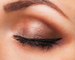 Closeup of womanish eye with neutral makeup photo