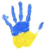 Handprint of a Ukrainian flag on a white photo