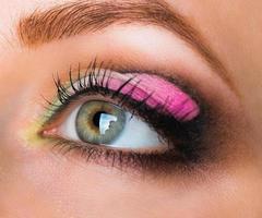 Closeup of womanish eye with glamorous makeup photo