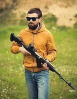 A man with an automatic rifle photo