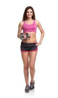 Beautiful slim woman with dumbbells, isolated on white photo