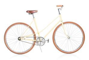 Stylish brown bicycle isolated on white photo