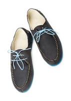 Black men's leather loafers with blue soles and laces on a white photo