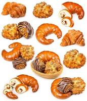 Collection of fresh and delicious pastries on a white photo