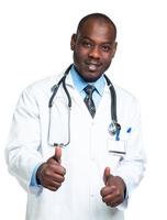 Portrait of a smiling male doctor with  finger up on white photo