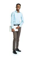 Happy african american college student standing with laptop on white photo