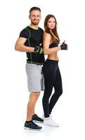 Sport man and woman after fitness exercise with a finger up on the white photo