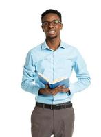 Happy african american college student with books in his hands standing on white photo