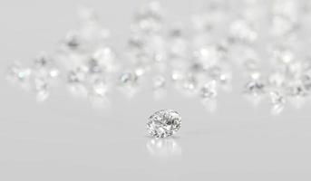 Diamonds group placed on glossy background 3d Rendering Soft Focus photo