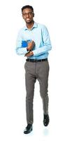 Happy african american college student standing with books in his hands on white photo