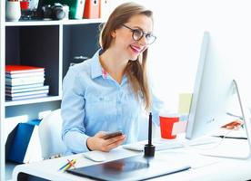 Graphic designer working at the home office - modern business concept photo