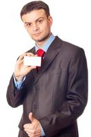 Businessman with a blank business card photo