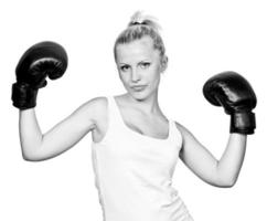 Beautiful blonde girl in boxing gloves photo