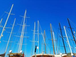Boat and yacht masts from Bodrum harbor. Turkey. photo