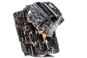 macro mineral stone sherle, schorl, black tourmaline on white background photo