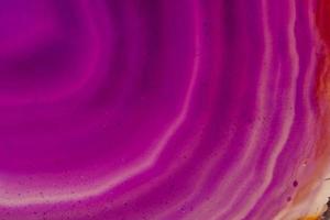Macro mineral stone Purple Agate breed a white background photo