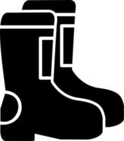 icono de vector de botas