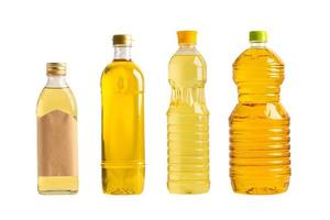 Vegetable oil with olive oil in different bottle for cooking isolated on white background with clipping path. photo