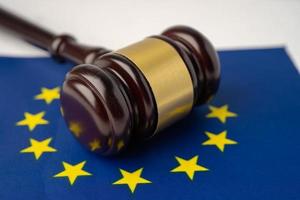 Gavel for judge lawyer on EU flag, finance concept. photo