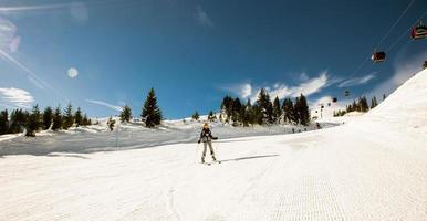 Girl at winter skiing bliss, a sunny day adventure photo