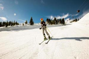 Girl at winter skiing bliss, a sunny day adventure photo