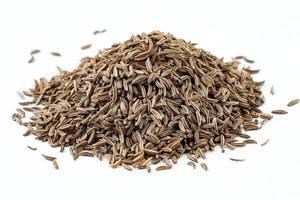 Cumin seeds. Pile of cumin seeds or caraway isolated on white background photo