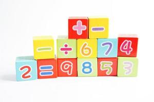 Number wood block cubes for learning Mathematic, education math concept. photo