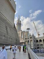 Mecca, Saudi Arabia, March 2023 - A beautiful daytime view of the Mecca Clock Tower in front of the Grand Mosque in Mecca, Saudi Arabia. photo