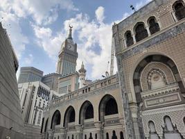 Mecca, Saudi Arabia, March 2023 - A beautiful daytime view of the Mecca Clock Tower in front of the Grand Mosque in Mecca, Saudi Arabia. photo