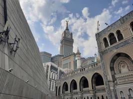 Mecca, Saudi Arabia, March 2023 - A beautiful daytime view of the Mecca Clock Tower in front of the Grand Mosque in Mecca, Saudi Arabia. photo