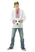 Ukrainian man in the national shirt with a ball photo