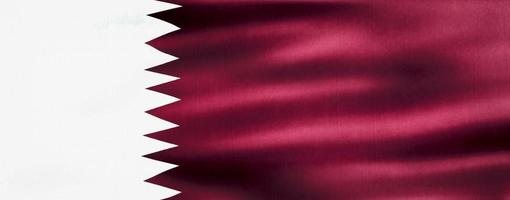 Ilustración 3d de una bandera qatar - bandera de tela ondeante realista foto