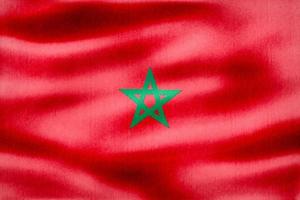 Ilustración 3d de una bandera de marruecos - bandera de tela ondeante realista foto