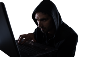 Hidden hacker works in the dark to steal data online png