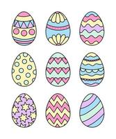 Hand drawn vector illustration isolated on white background. Set of 9 Easter eggs in pastel colors.
