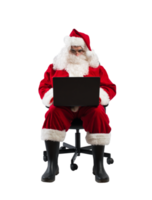 santa claus works with his laptop for christmas png