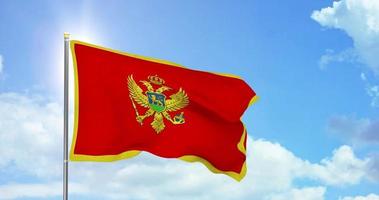 Montenegro politics and news, national flag on sky background footage video