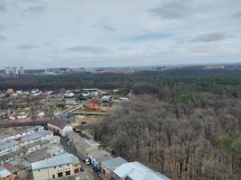 Panorama of the city from the height of a multi-storey building photo