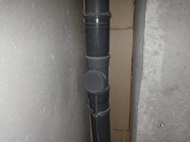 Installation of plumbing in a new apartment photo