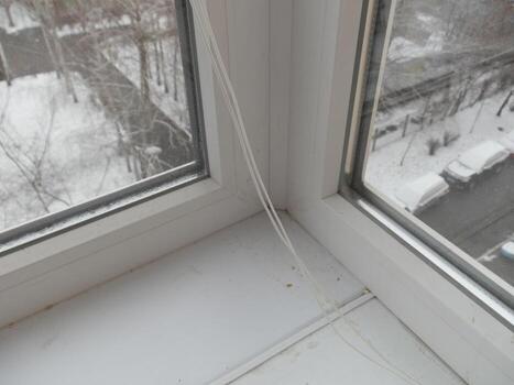Warming and cladding with slabs of a balcony in an apartment house photo