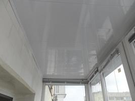 Warming and cladding with slabs of a balcony in an apartment house photo